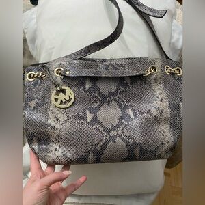 Barely used- MK snake pattern hand bag